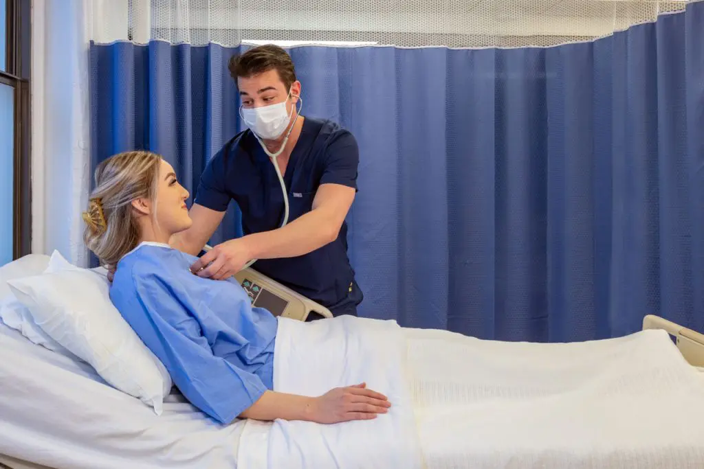 nurse attending a patient